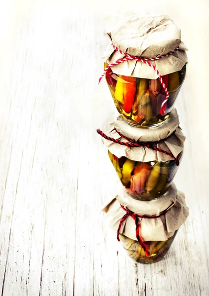 closeup view of canned banks on wooden background