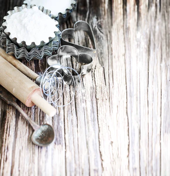 bakery manual equipment on old vintage wooden table