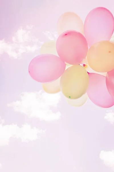 Colorful big balloons on sky background