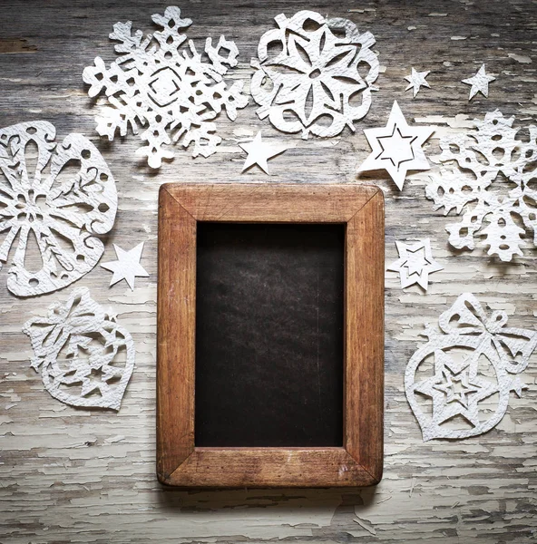 Pohled Shora Vánoční Pozadí Sněhové Vločky Tabuli Nad Dřevěný Stůl — Stock fotografie