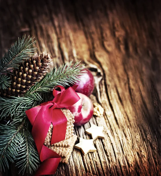 Christmas Ornaments Fir Branches Heap Wooden Surface — Stock Photo, Image