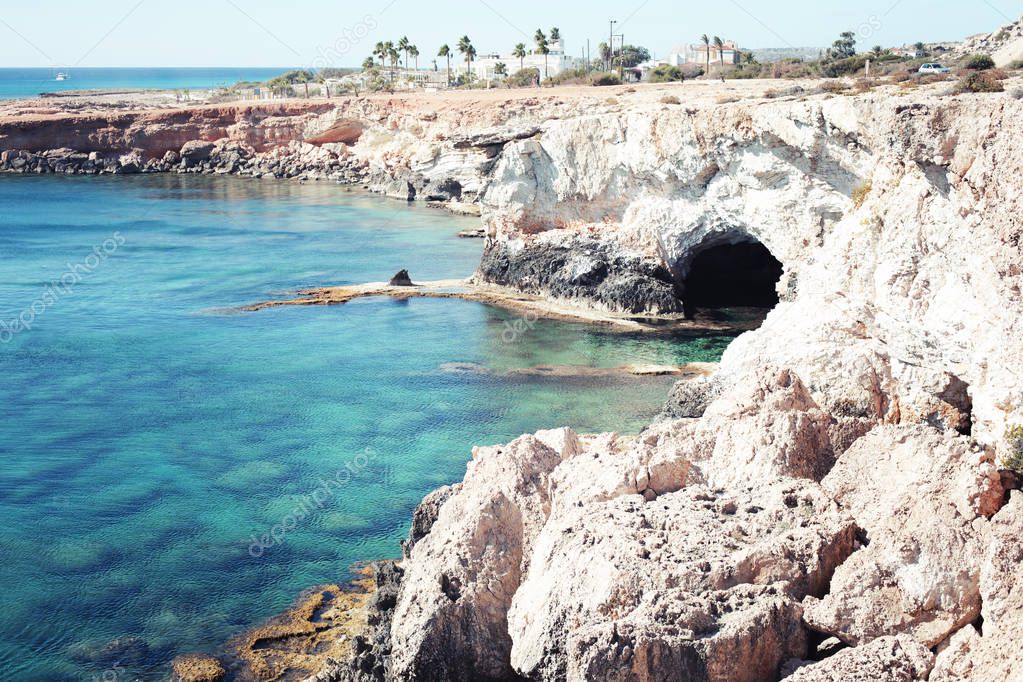 Scenery of rocky coast of Cyprus island, Mediterranean Sea in summer vacation background