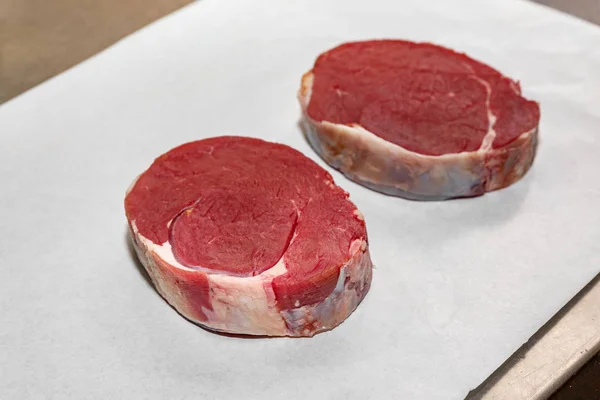 Raw sirloin steaks top view, shallow depth of field