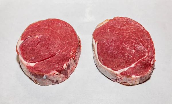 Raw sirloin steaks top view