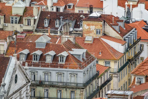 Lisbon run-down roofs long shot view with different colors — Stock Photo, Image