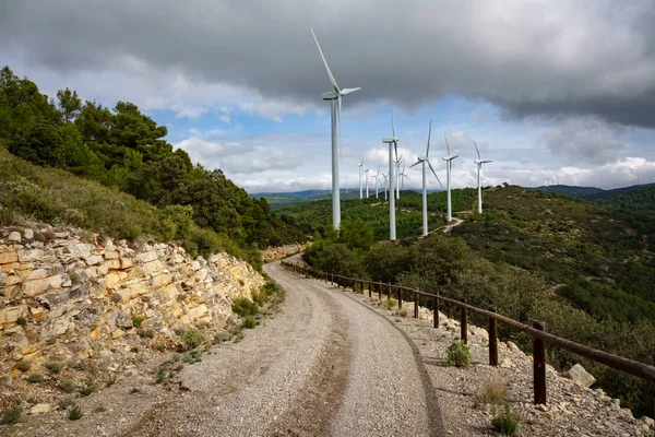 Windmill farm in the mountain, cloudy day — Stock Photo, Image