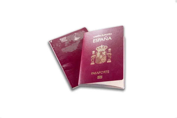 New spanish passport over old expired one, white background — Stock Photo, Image