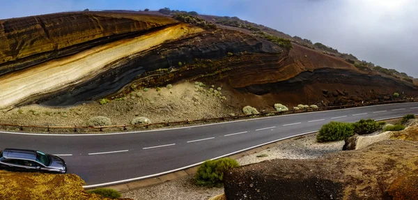 Car driving over Teide volcano road, panoramic view — Stock Photo, Image