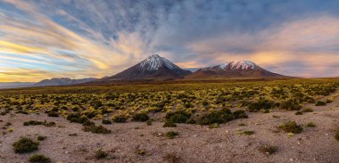 Huge panorama at dusk over Licancabur volcano, Atacama desert clipart