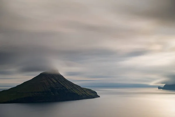 Ultra long exposure of islet in Faroe Islands at sunset — Stock Photo, Image