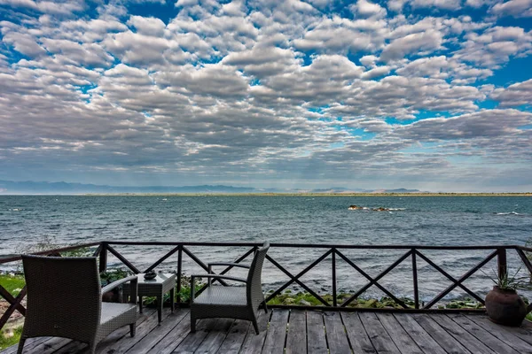 Sunrise at lake Malawi with cloudy sky — Stock Photo, Image