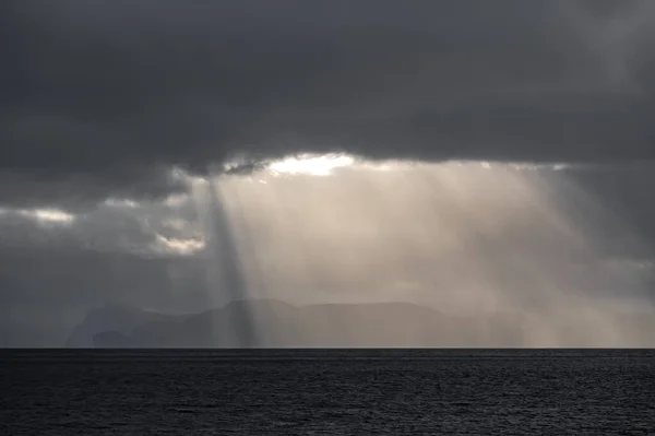 Ray lights over islands at sunset with text space — Stock Photo, Image