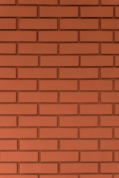 強い赤縦レンガ壁の背景 オレンジ色のタイル — ストック写真