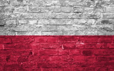 Bir eski tuğla duvar arka plan, yüzey üzerinde Polonya bayrağı