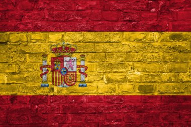 İspanya bayrağı bir eski tuğla duvar arka plan, yüzey üzerinde