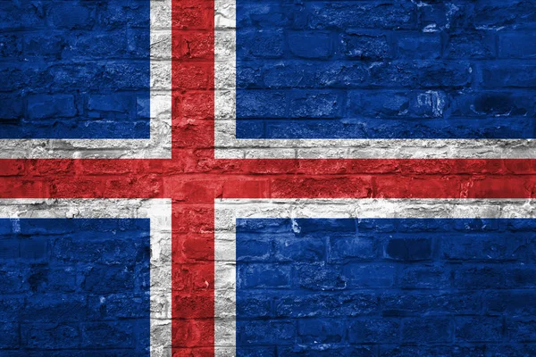 冰岛的旗子在老砖墙背景 — 图库照片