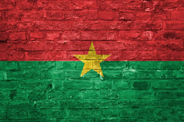 Bandeira Burkina Faso Sobre Fundo Parede Tijolo Velho Superfície — Fotografia de Stock