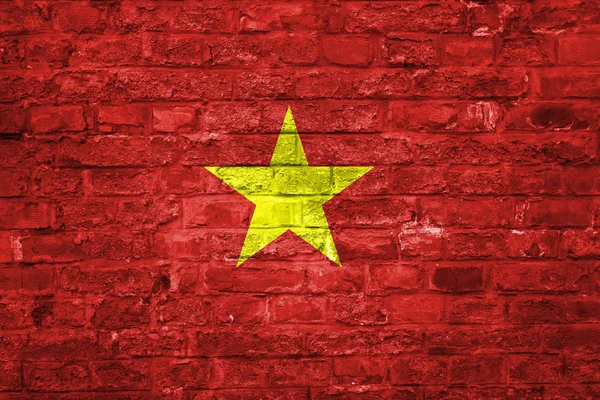 Vietnam bayrağı bir eski tuğla duvar arka plan, yüzey üzerinde