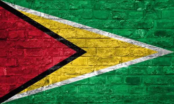 Flagge Von Guyana Über Einem Alten Backsteinmauerhintergrund Oberfläche — Stockfoto