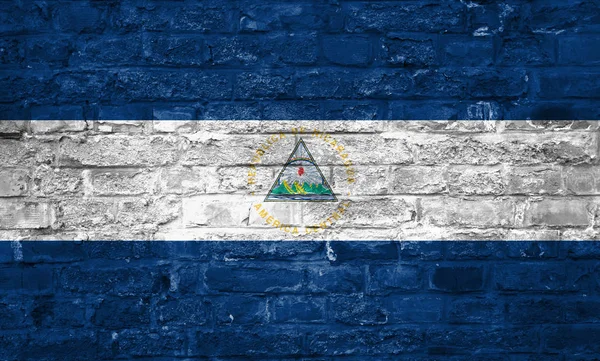 Флаг Никарагуа Фоне Старой Кирпичной Стены Поверхность — стоковое фото