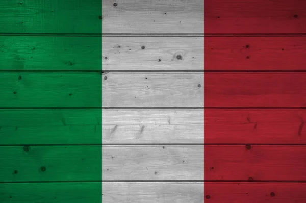 Flag of Italy on wooden background, surface. Wooden wall, planks. National flag.