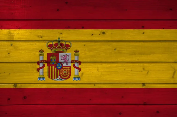 Flag of Spain on wooden background, surface. Wooden wall, planks. National flag.