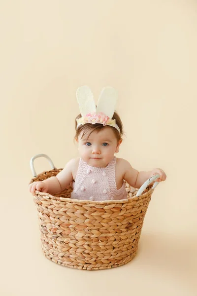 Baby Girl Easter Bunny Ears Knitted Body Wicker Basket — Stock Photo, Image