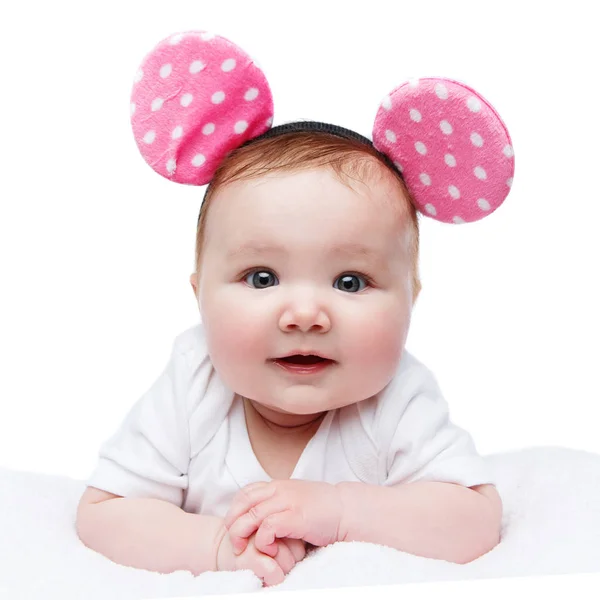 Grappige babymeisje in muis oren hoofdband Stockafbeelding