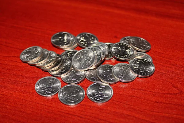 coins worth five cents on the table