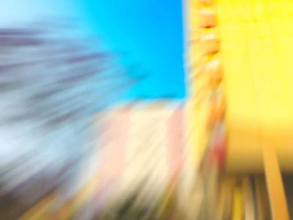 Abstract motion blur effect. City on a sunny day — Stock Photo, Image