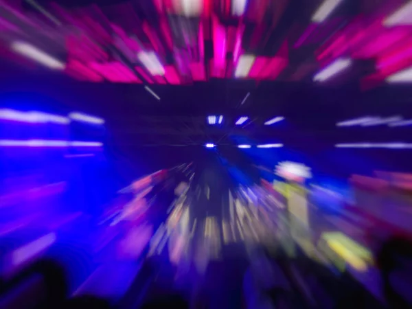 Abstraktní motion blur efekt. Bokeh osvětlení ve shodě s publikem — Stock fotografie