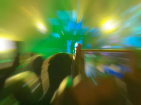 Abstract motion blur effect. Bokeh lighting in concert with audience — Stock Photo, Image