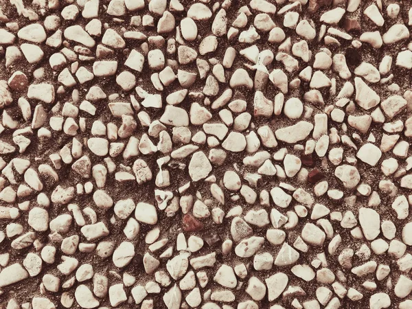 Wall of small stones pebbles texture background — Stock Photo, Image