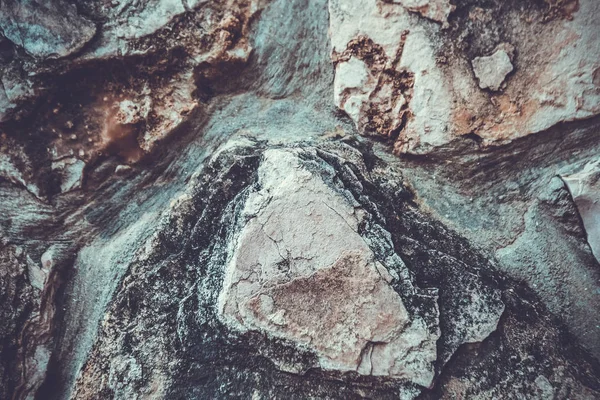 Primo piano del muro di pietra naturale. Struttura della parete di pietra — Foto Stock