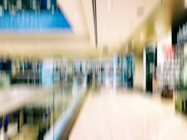 Efekt rozmycia ruchu streszczenie. Centrum handlowe jako tło, bokeh — Zdjęcie stockowe