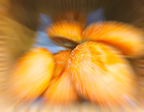 Fresh buns on the counter of the grocery store. Abstract motion blur effect. — Stock Photo, Image