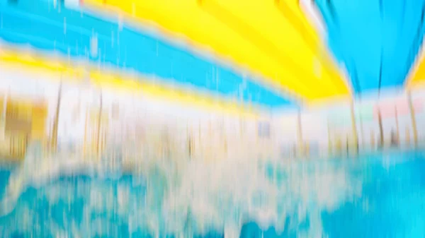 Размытое изображение бассейна. Абстрактный эффект размытия движения — стоковое фото