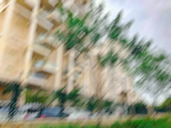 Absztrakt motion blur effekt. Város, egy napsütéses napon — Stock Fotó