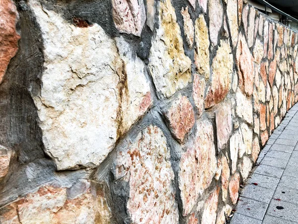 Doğal taş duvarı kapatın. Taş duvar dokusu 