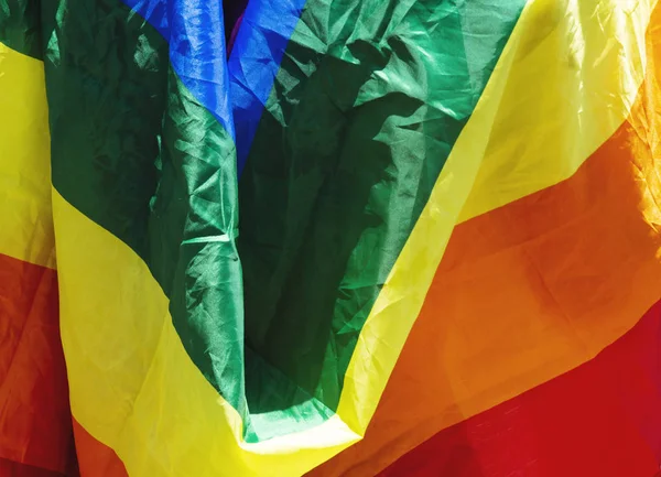 Gay rainbow flag on Pride Parade, close up. — Stock Photo, Image