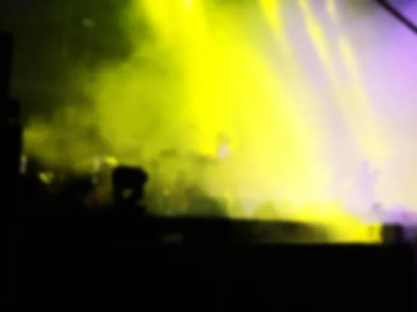 Fundo abstrato desfocado. Iluminação Bokeh em concerto com o público . — Fotografia de Stock