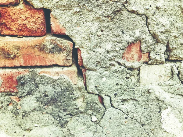 Pièce d'un vieux fond de mur de brique en ruine — Photo