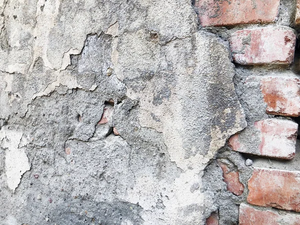 파괴 벽돌 오래 된 벽 배경의 조각 — 스톡 사진