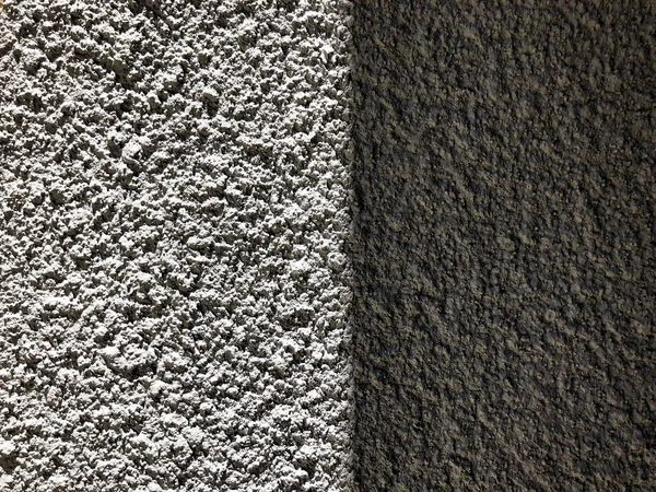 Close-up šedé strukturované pozadí. Pohled na přírodní abstraktní zdi. Přírodní textury a pozadí. — Stock fotografie