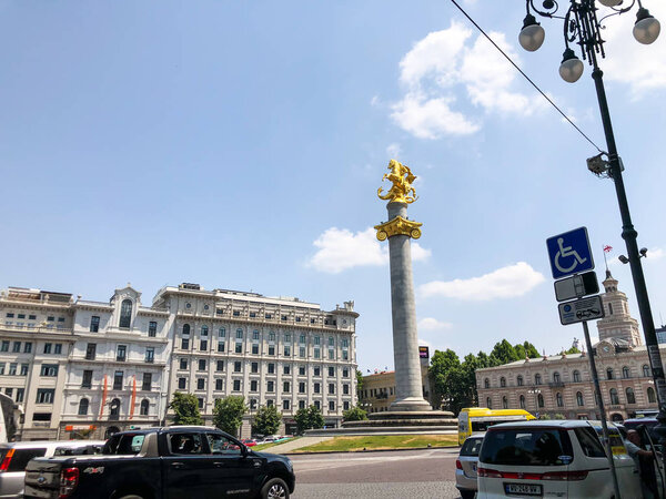TBILISI, GEORGIA - July 10, 2018: View of the  freedom square and the Freedom Monument (St. George Statue) in Tbilisi, Goergia.