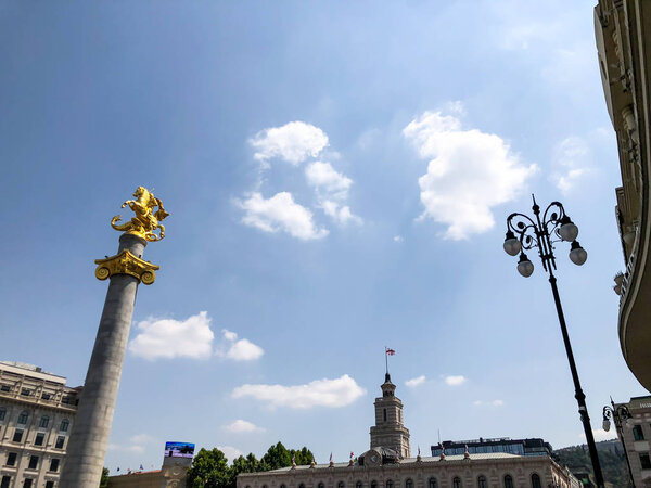 TBILISI, GEORGIA - July 10, 2018: View of the  freedom square and the Freedom Monument (St. George Statue) in Tbilisi, Goergia