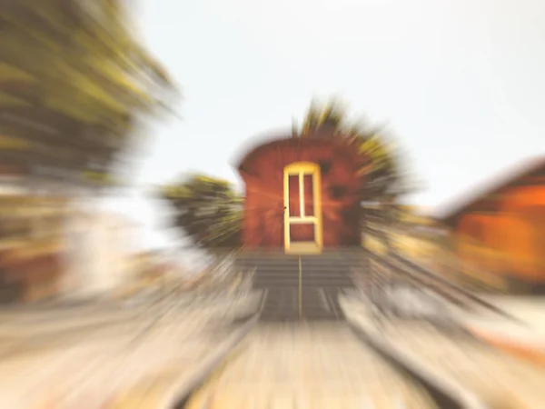 Overview of the rails and a wagon, in the old train station.  Abstract motion blur effect — Stock Photo, Image