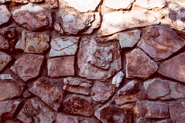 Doğal taş duvarı kapatın. Taş duvar dokusu 