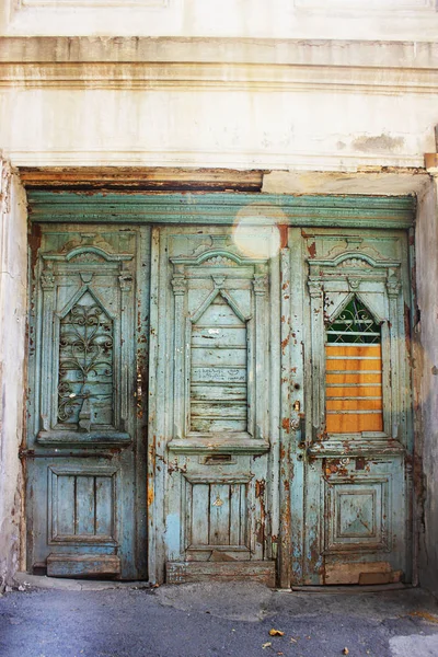 Old Tbilisi architecture,The entrance door\
 and exterior decor in summer day.