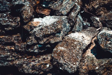 Taşlar arka plan, gri büyük taşlar, taş duvarlarda kayalar, taş çitin bir kısmı, taştan sınırın yakın çekimi.